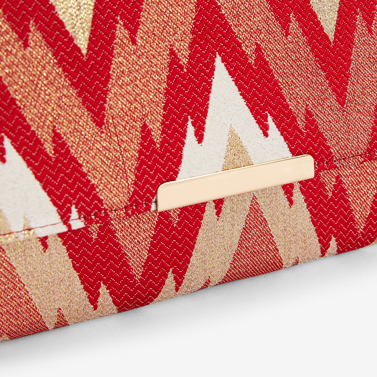 Pochette de soirée motifs zigzag corail