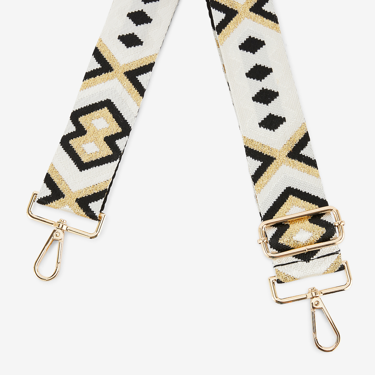 Bandoulière à motifs géométriques noir, blanc, doré