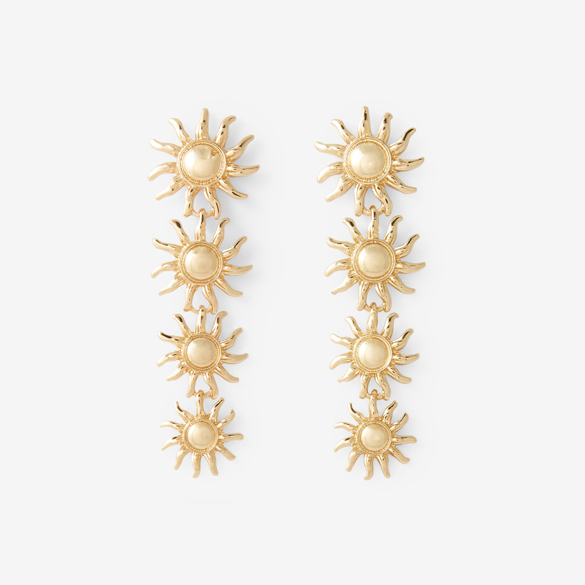 Longues boucles d'oreilles soleil