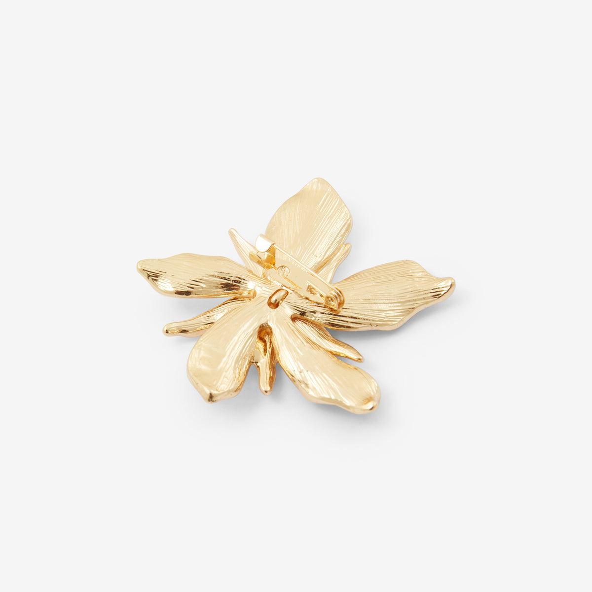 Broche fleur en métal et époxy