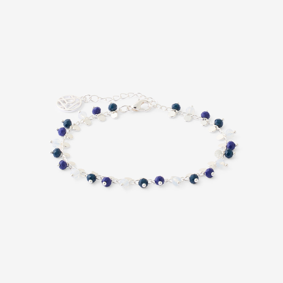 Chaîne de cheville argentée et perles à facettes bleues