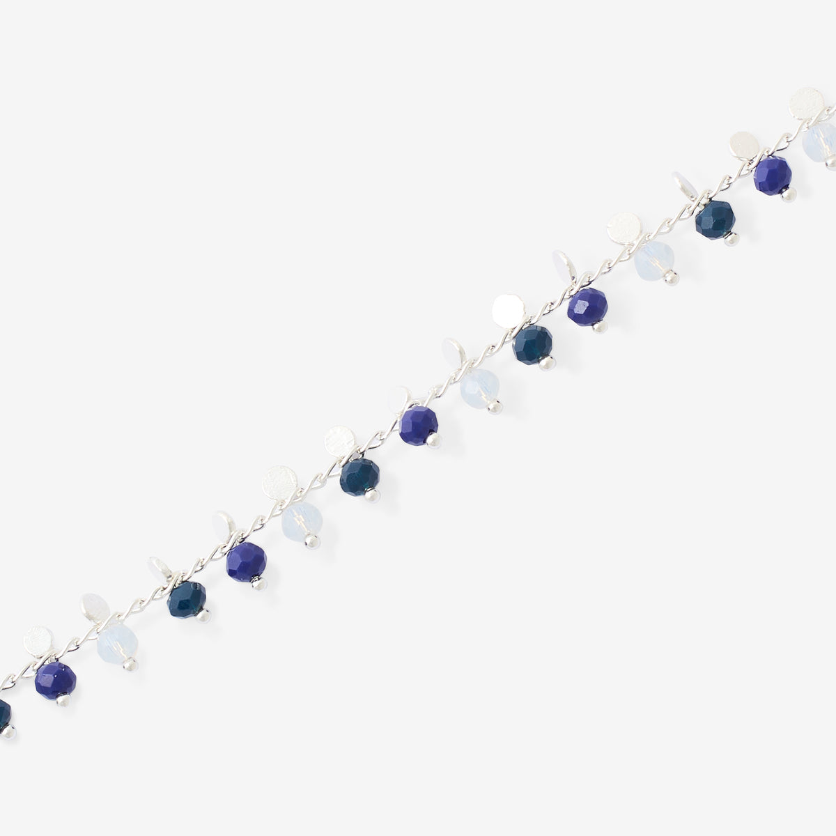 Chaîne de cheville argentée et perles à facettes bleues
