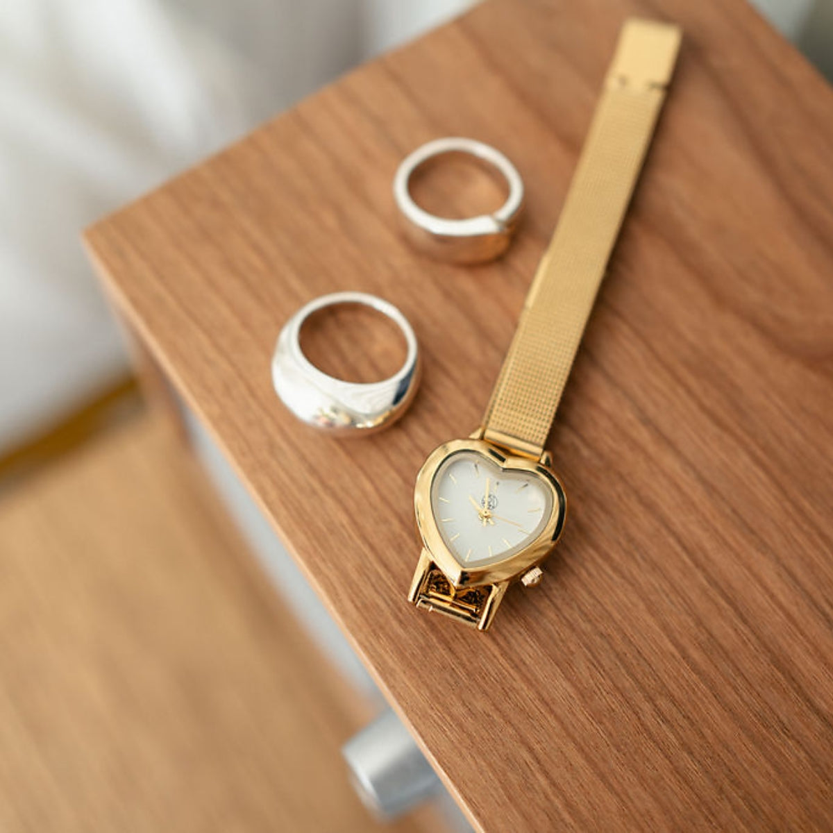 Montre cadran cœur bracelet maille doré