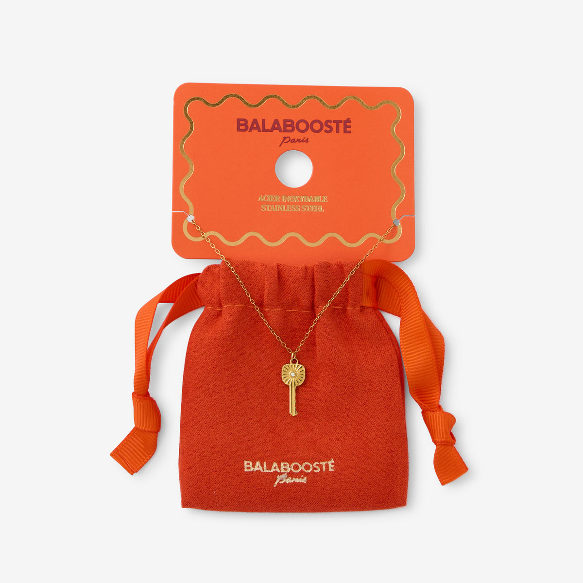 Collier pochon pendentif clé acier inoxydable