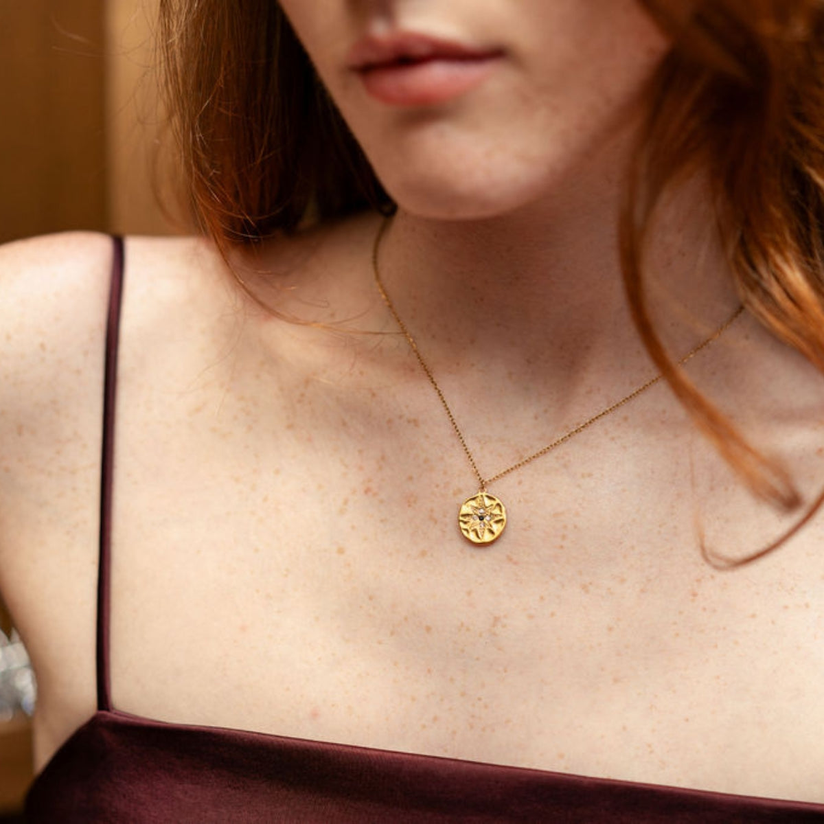 Collier pochon médaillon étoile acier inoxydable