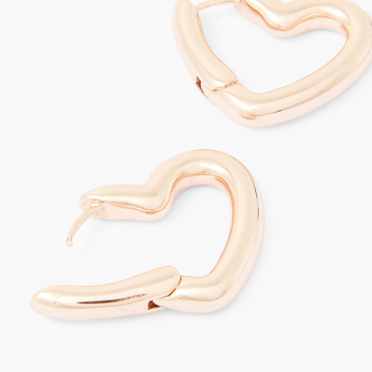 Petites créoles articulées cœurs dorés