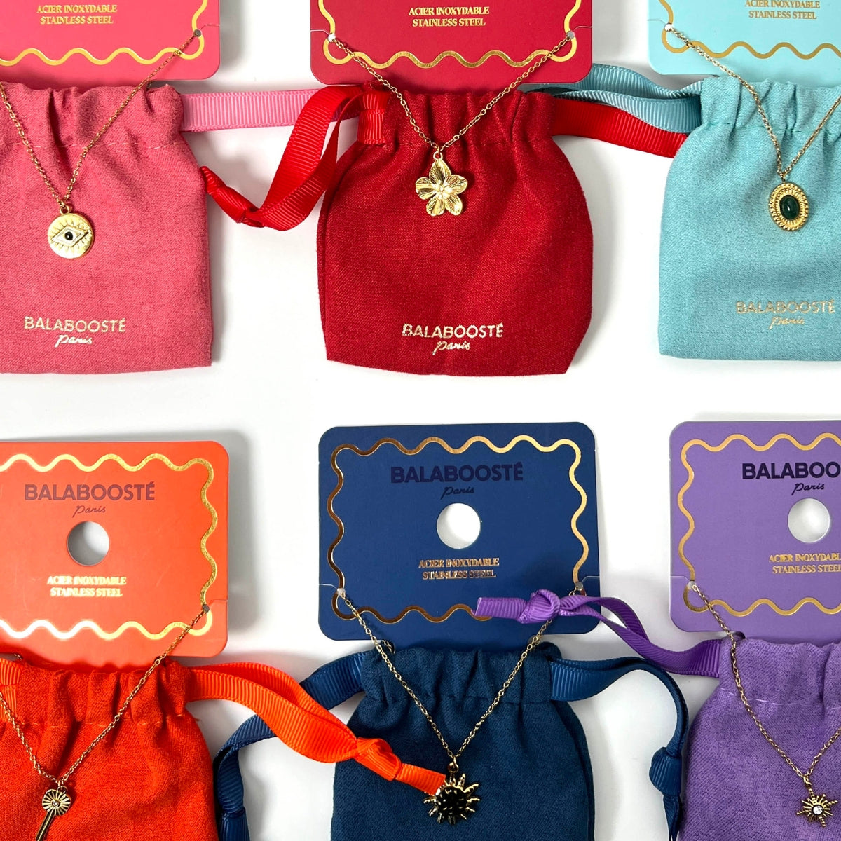 Collier pochon pendentif soleil acier inoxydable