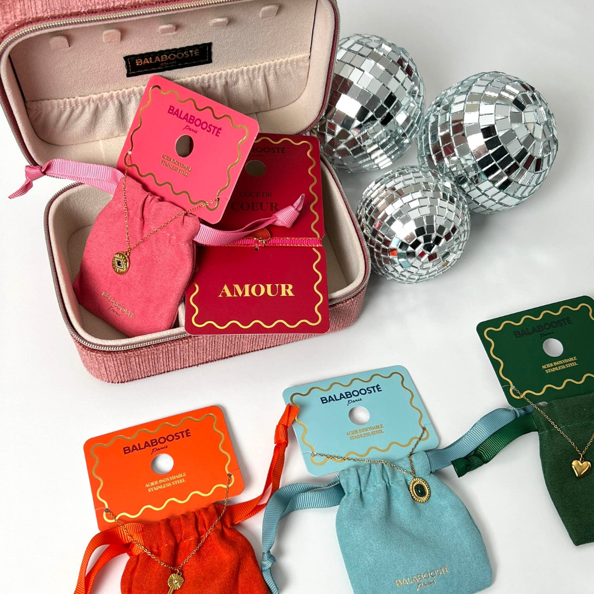 Collier pochon pendentif coeur acier inoxydable