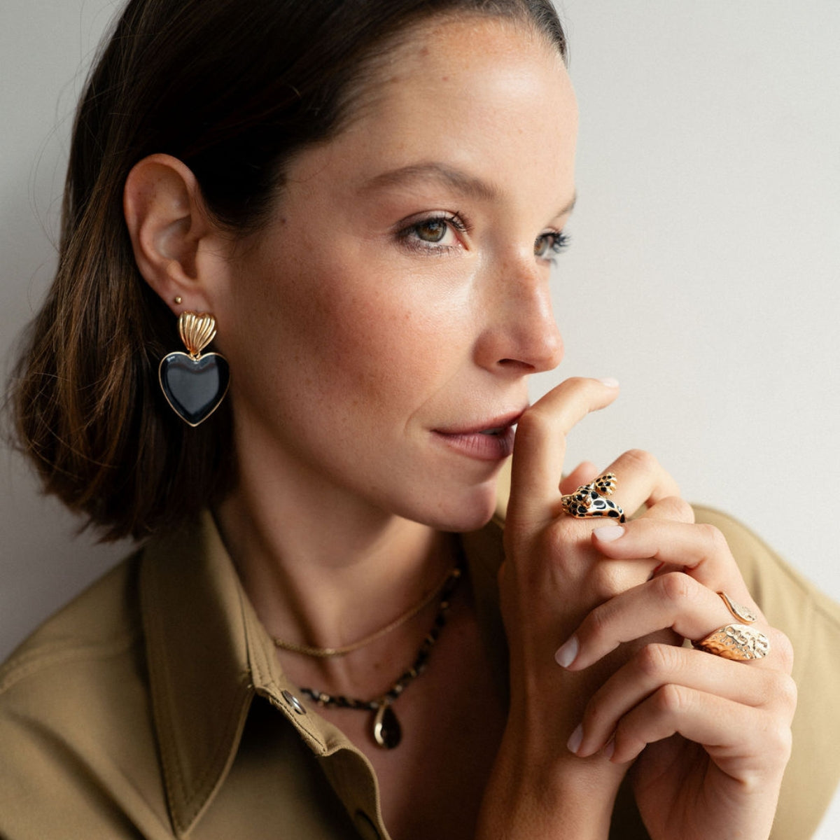 Boucles d’oreilles cœurs noir et doré