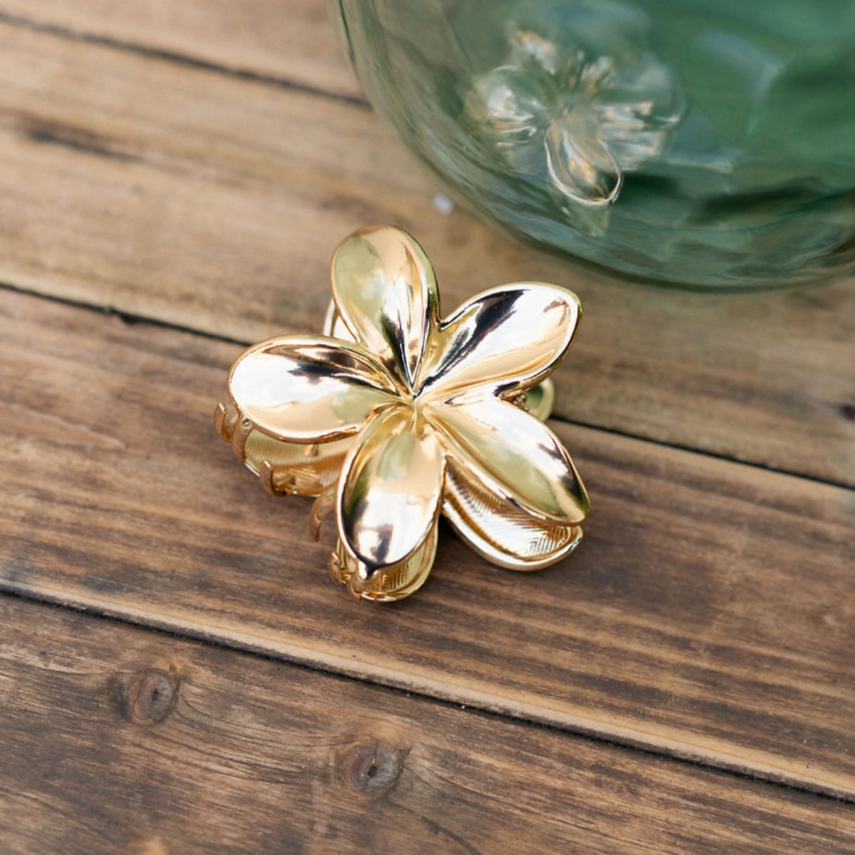Pince à cheveux fleur tropicale dorée