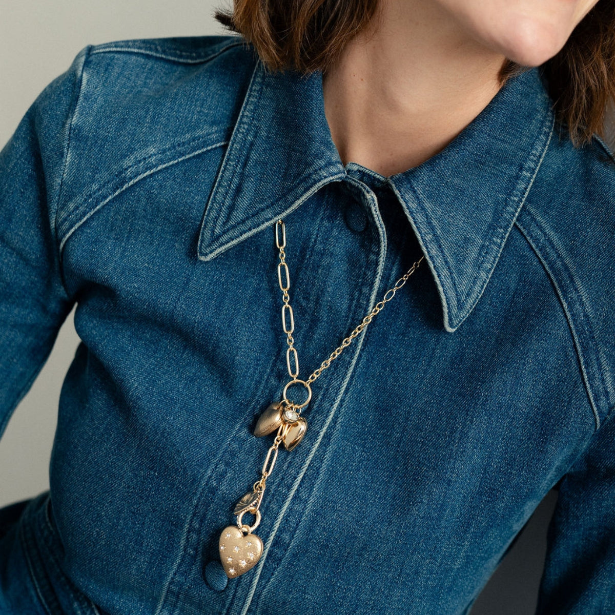 Collier Y pendentifs cœurs dorés