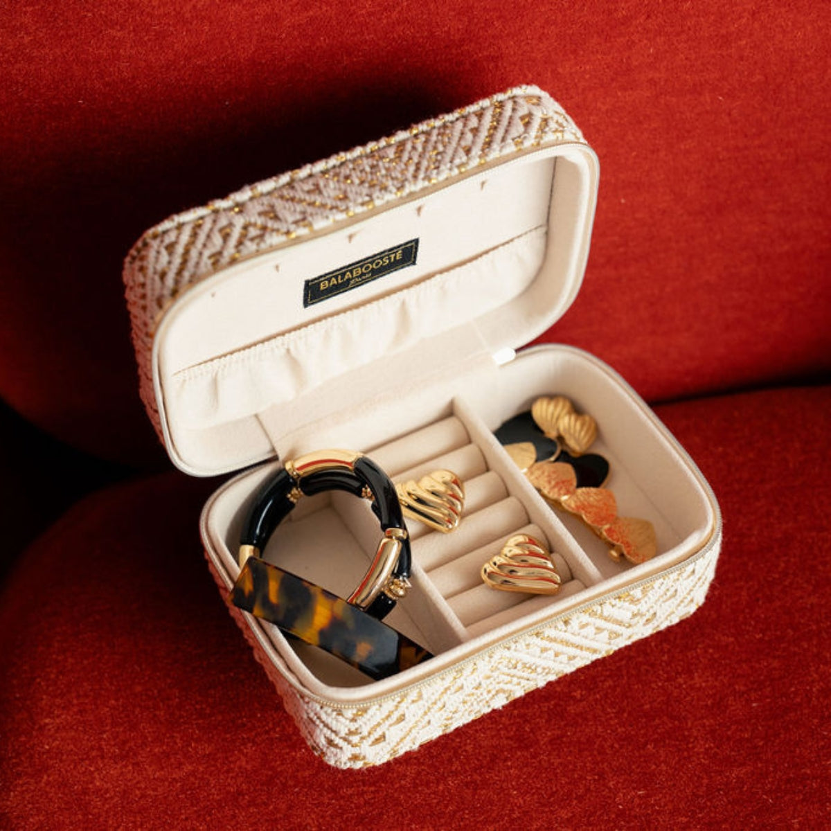 Boîte à bijoux rectangulaire à motif géométrique doré et ivoire