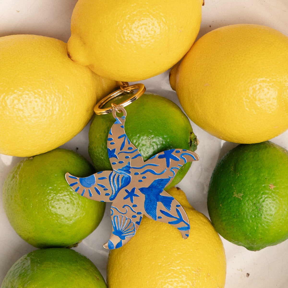 Porte-clés étoile de mer imprimé bleu