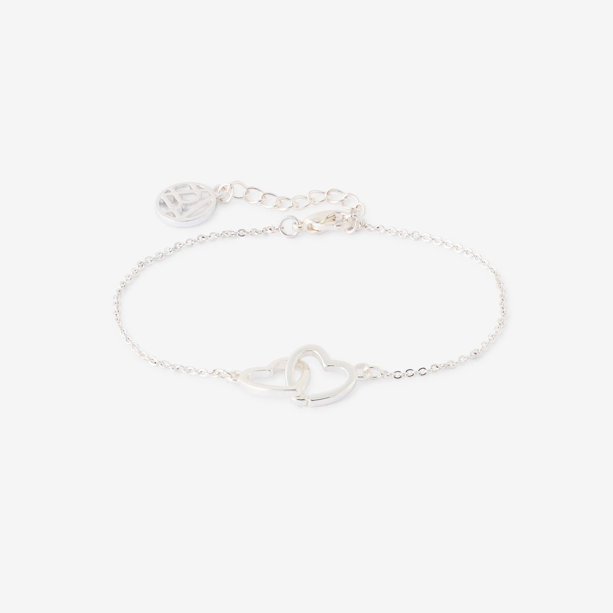 Bracelet chaîne fine cœurs entremêles argentés