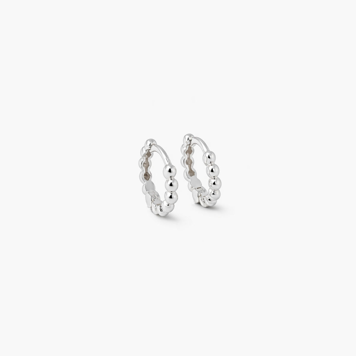 Petites créoles en argent garanti