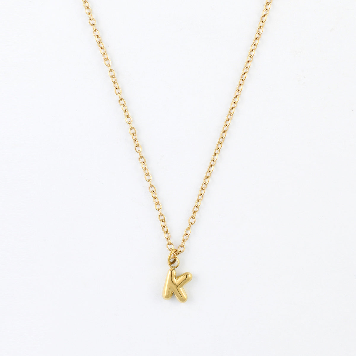 Collier à pendentif lettre K acier inoxydable