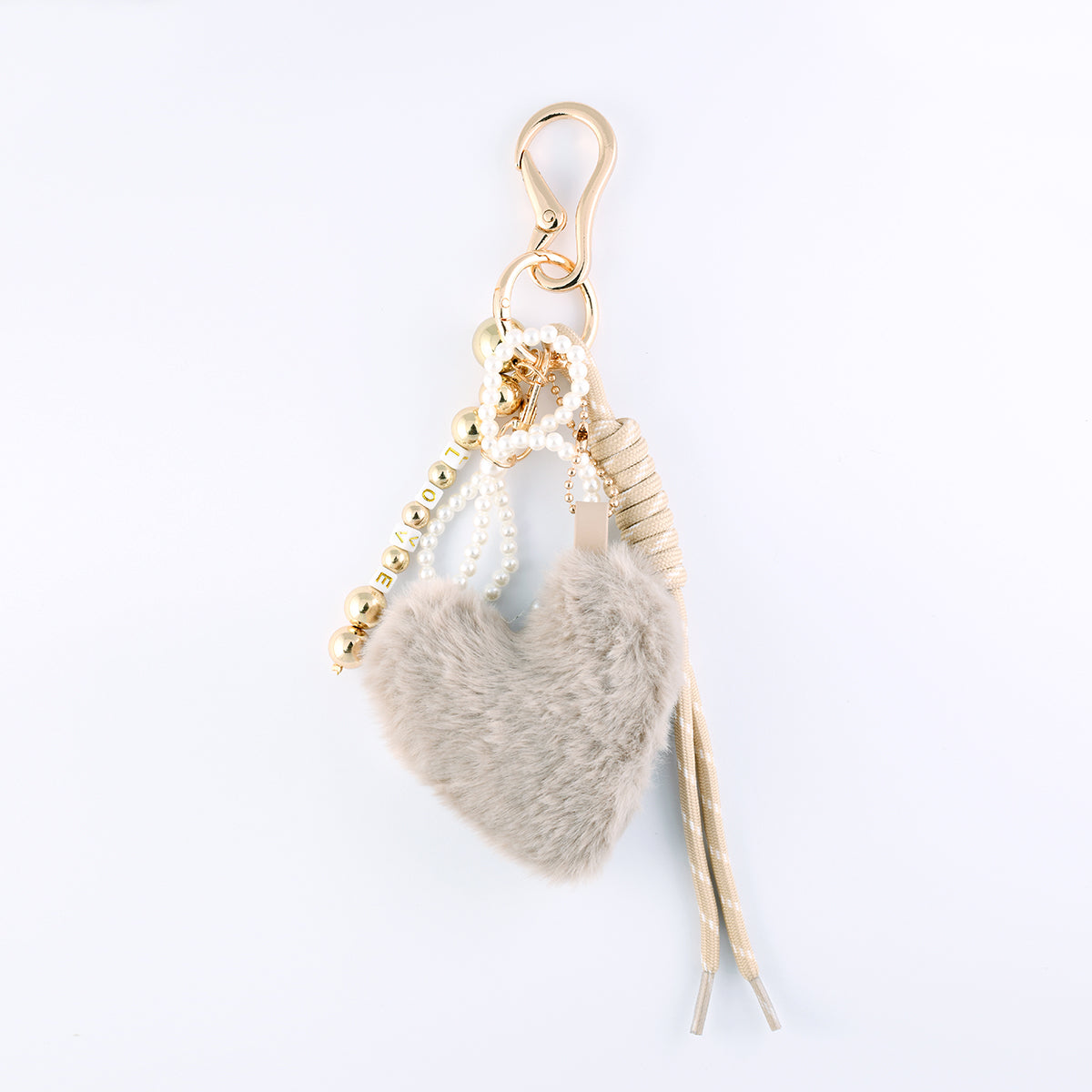 Bijoux de sac cœur beige en fausse fourrure