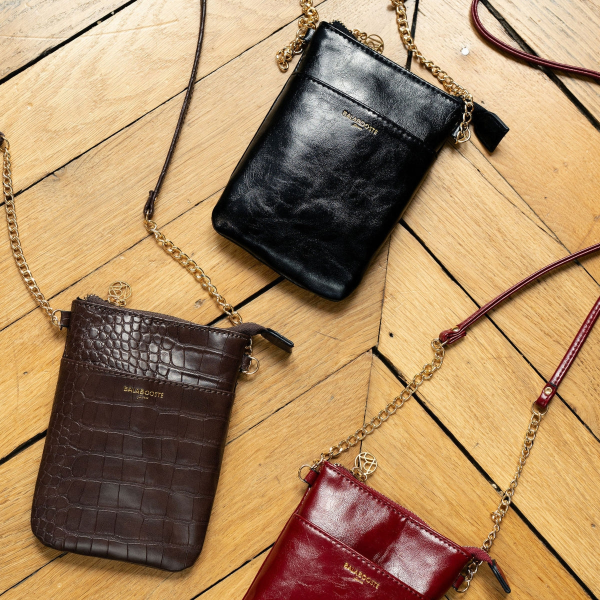 Pochette de téléphone effet cuir brillant noir