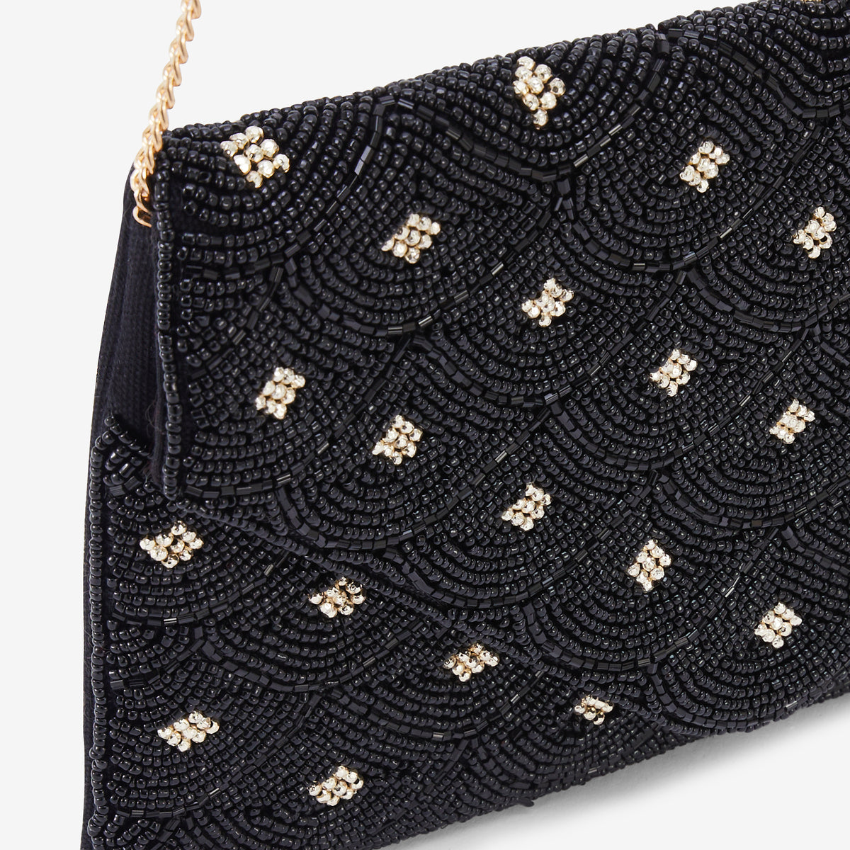 Pochette perlée noire et dorée