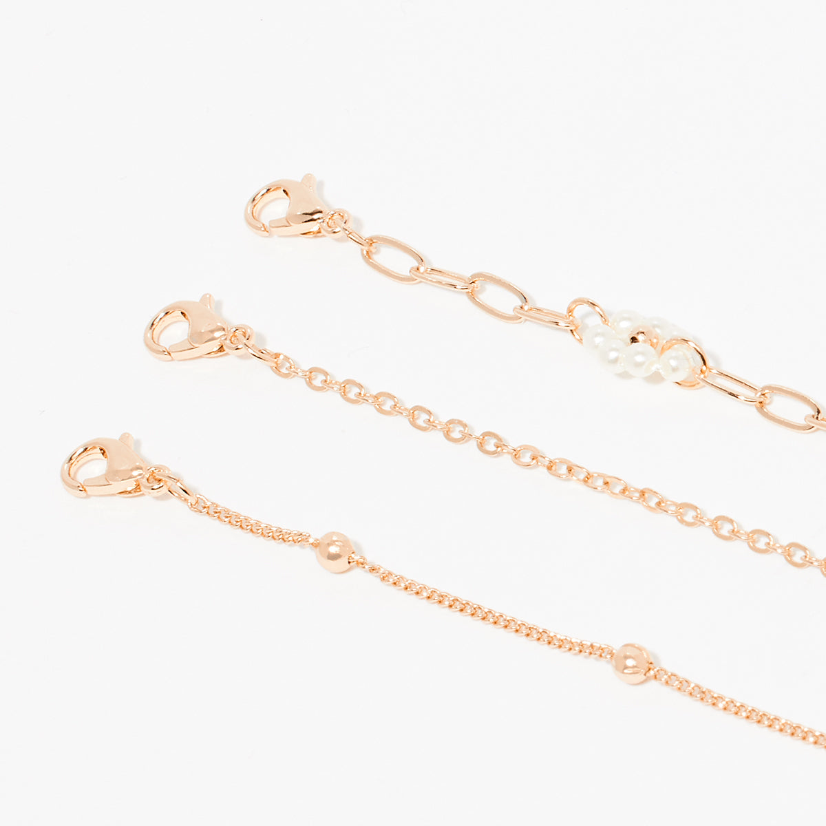 Set de 3 bracelets chaine avec fleurs et perles d'imitation - doré