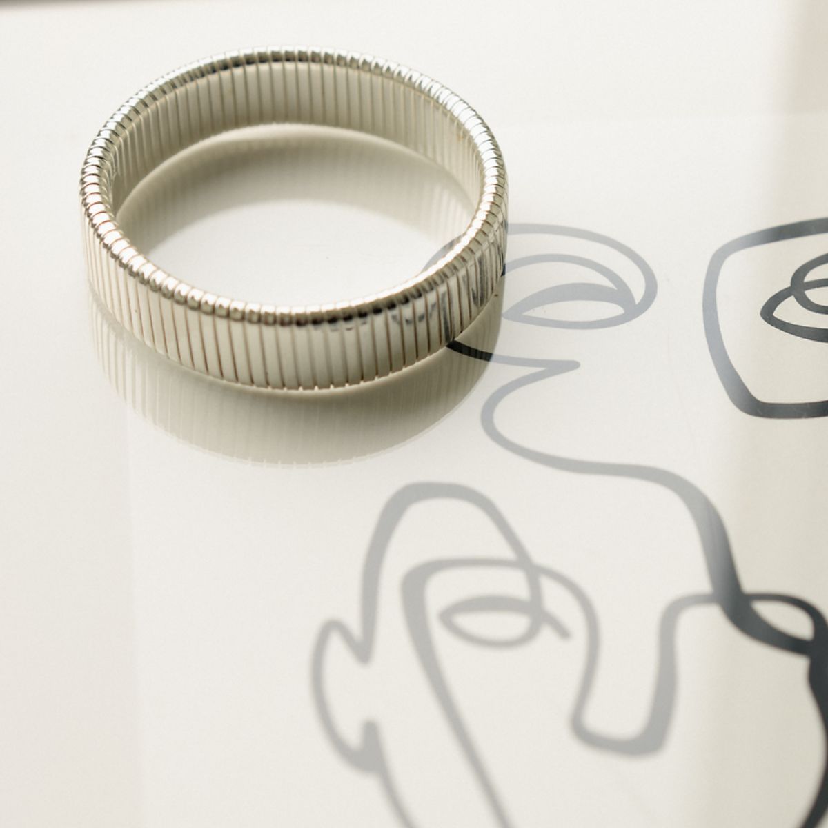 Bracelet strié argenté NE PAS ACTIVER