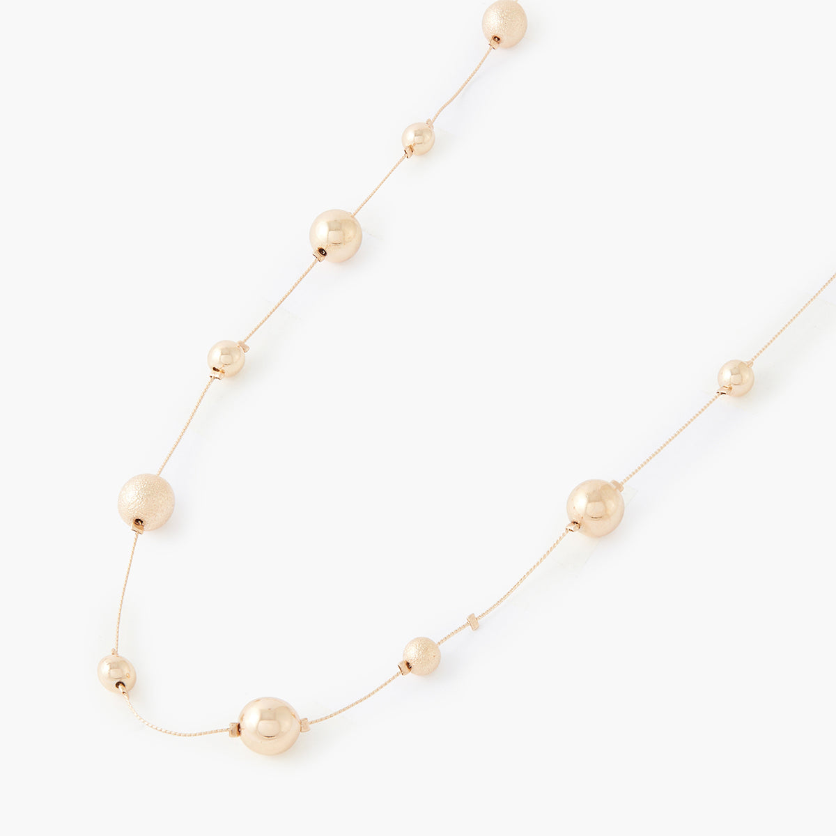 Sautoir boules dorées