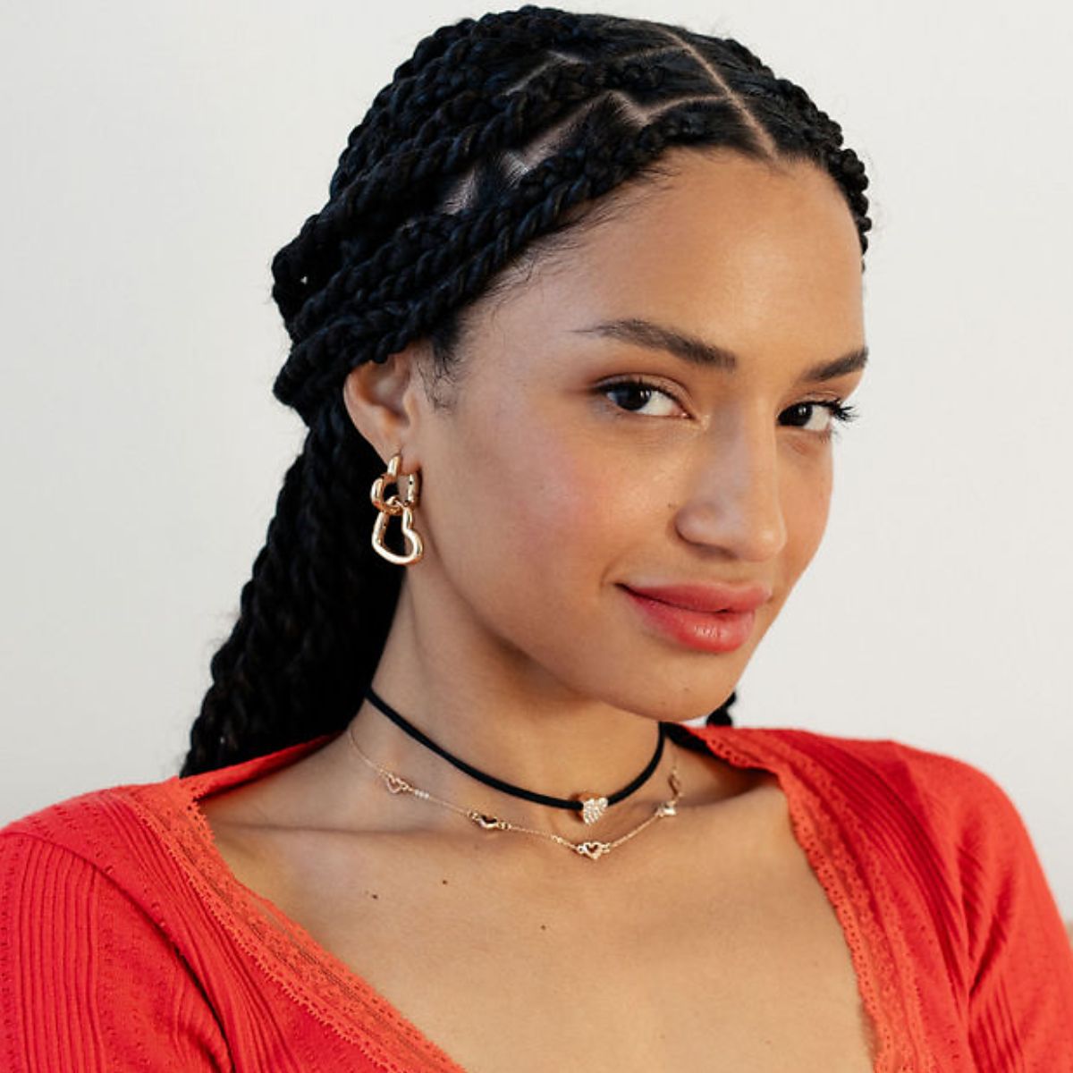 Set de 2 colliers cœur suédine noire et chaine dorée