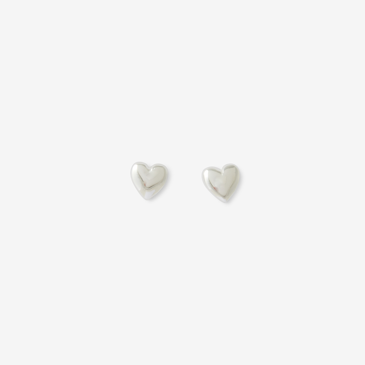 Puces d'oreilles cœur argenté en argent garanti