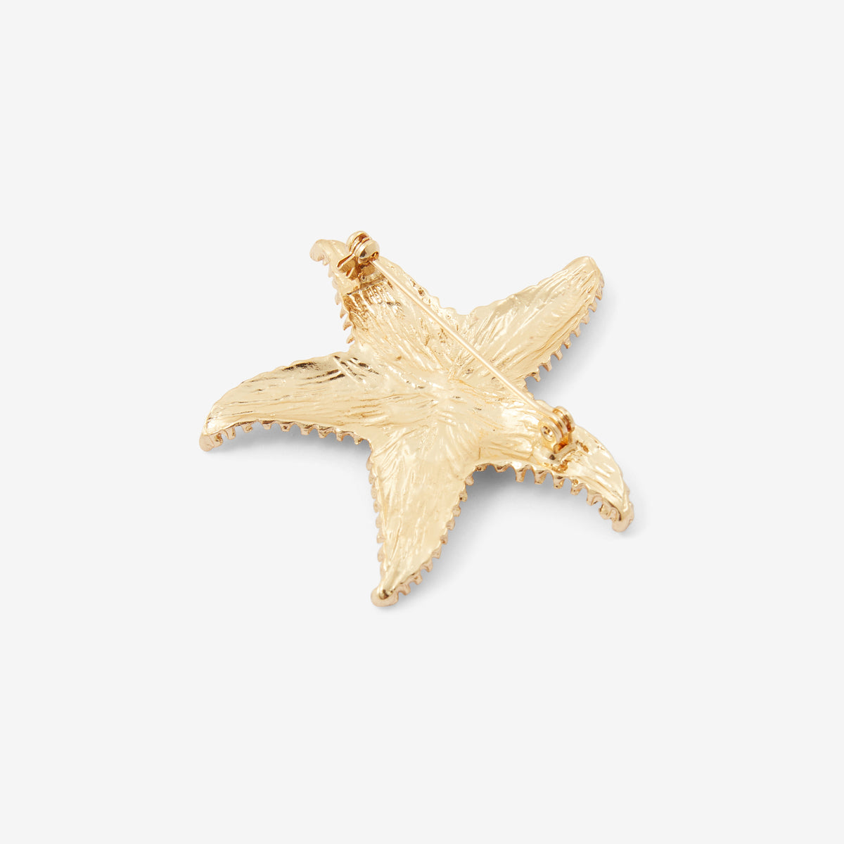 Broche étoile de mer dorée