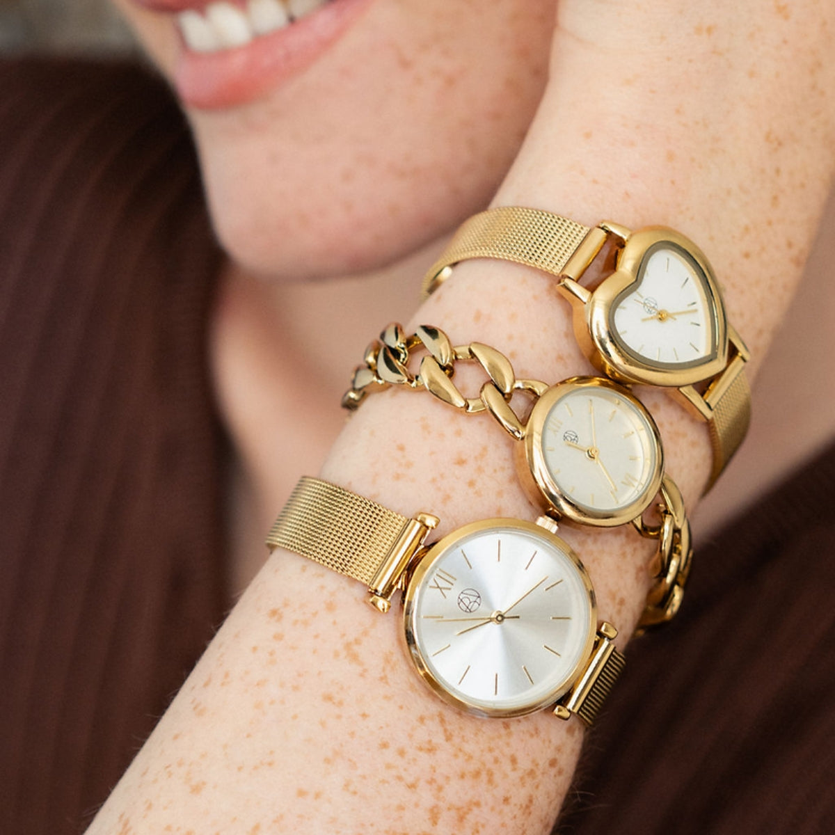 Montre cadran cœur bracelet maille doré