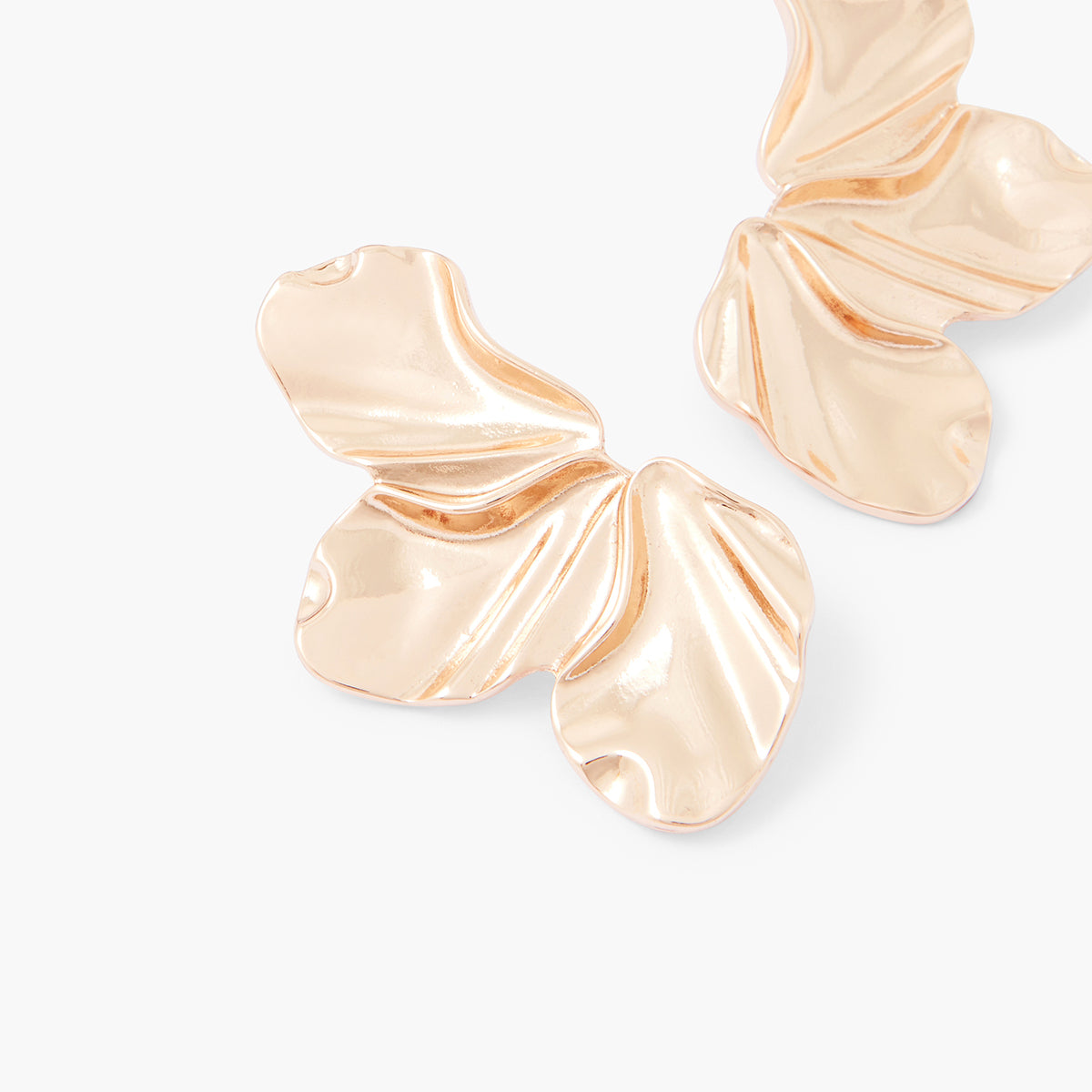 Boucles d'oreilles demi fleur dorées