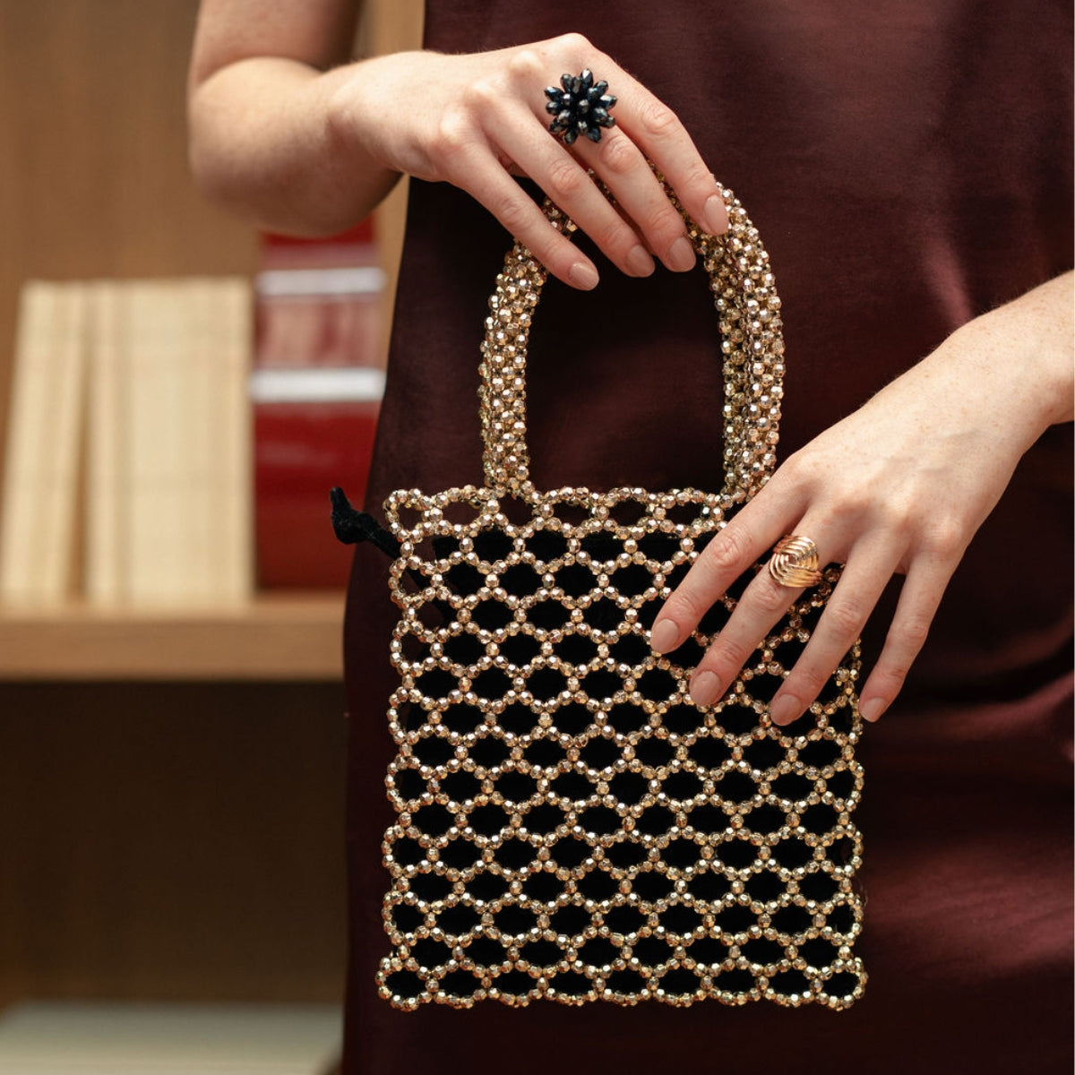 Petit sac perlé porté main