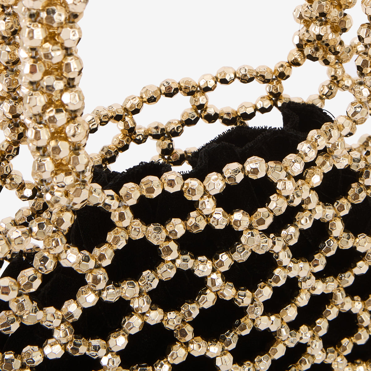 Petit sac perlé porté main