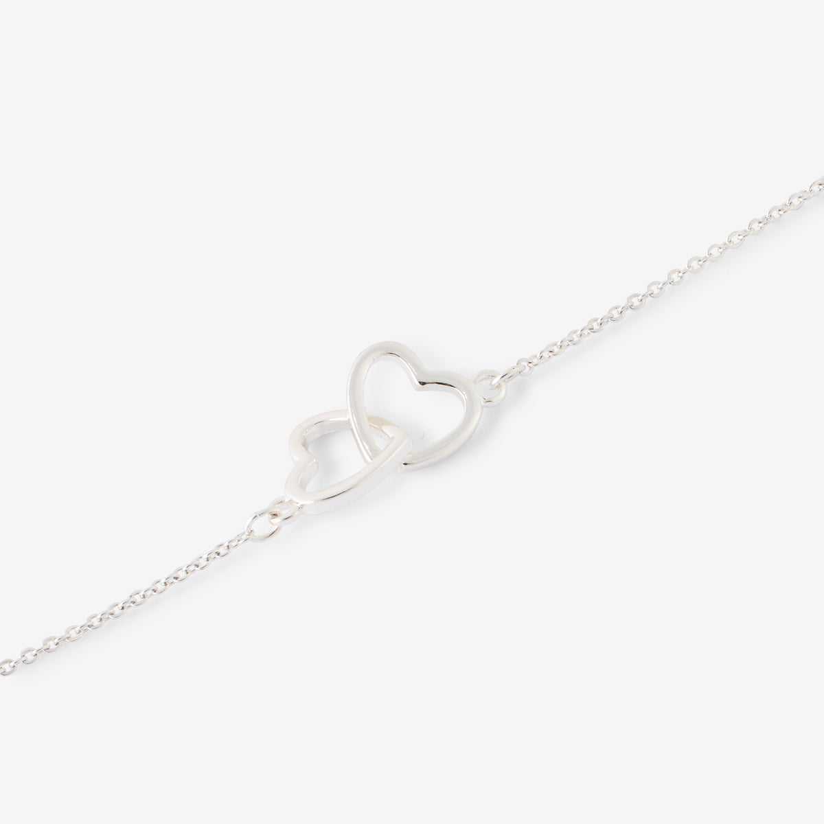 Bracelet chaîne fine cœurs entremêles argentés