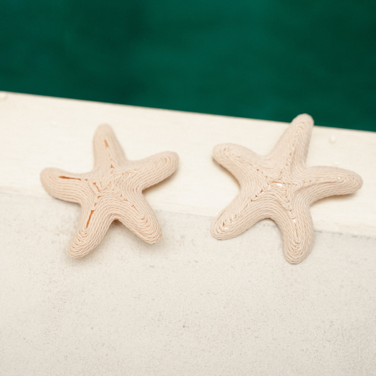 Boucles d'oreilles étoile de mer beige