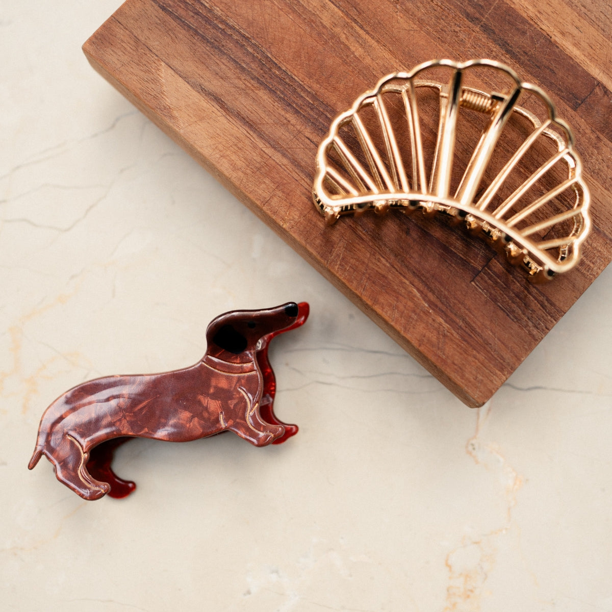 Pince à cheveux coquillage doré