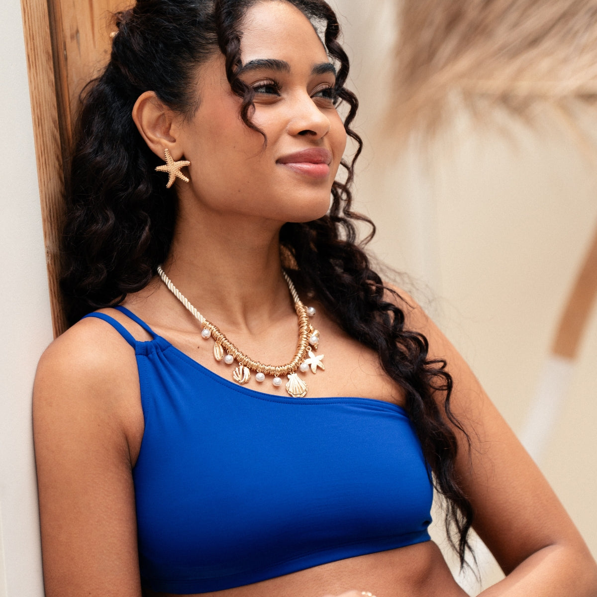 Collier cordon coquillages blanc et doré