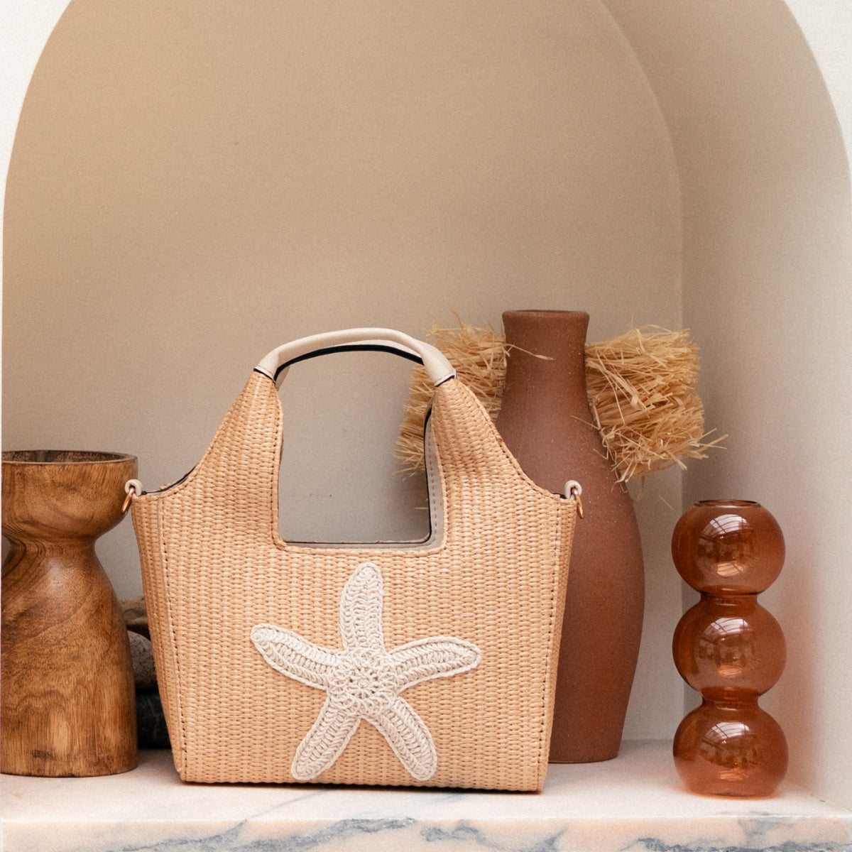 Sac porté main effet paille étoile de mer écru