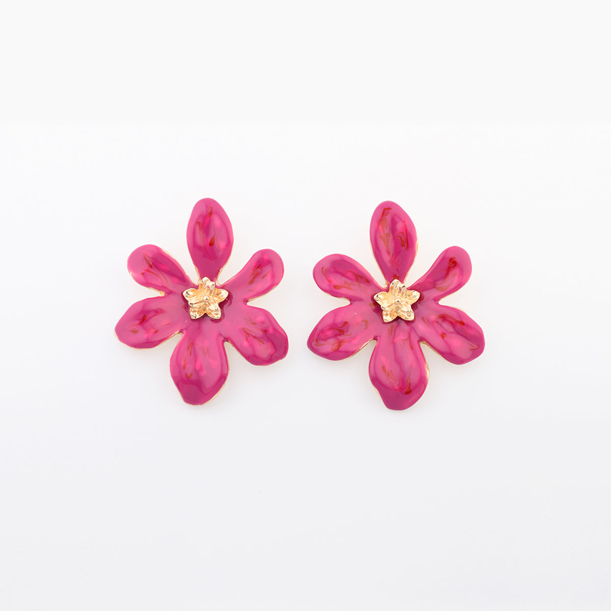 Boucles d’oreilles fleurs fuchsia