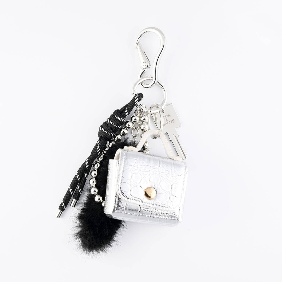 Bijoux de sac mini sac argenté et pompon noir