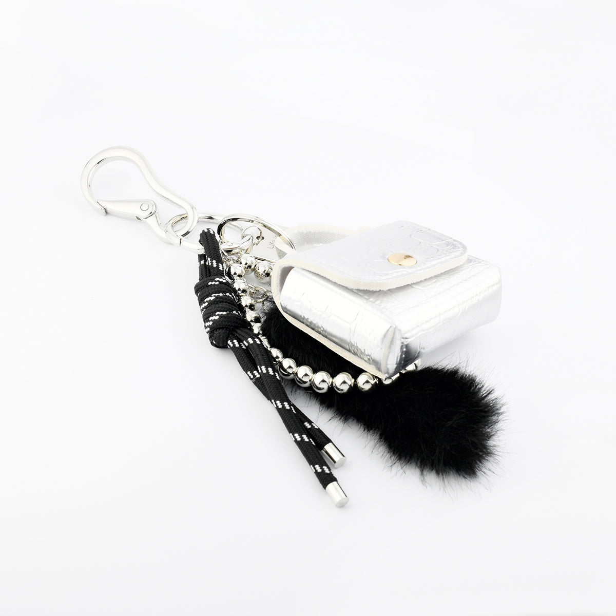 Bijoux de sac mini sac argenté et pompon noir