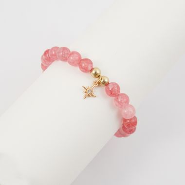 Bracelet élastique en Quartz rose et breloque étoile 